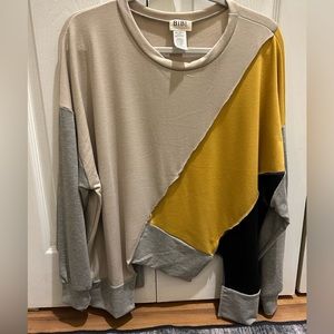 BiBi size small asymmetrical colorblock sweatshirt